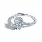 Aurora oval safir forlovelsesring med dobbelt diamant halo i hvidguld